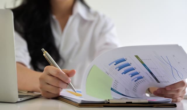 A line chart comparing rising revenue against declining patient visit counts